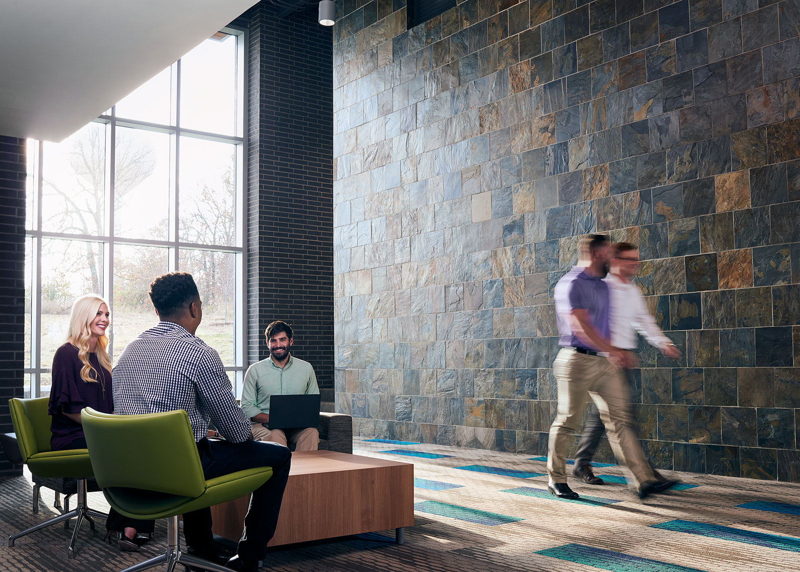 people in lobby for a corporate brand shoot