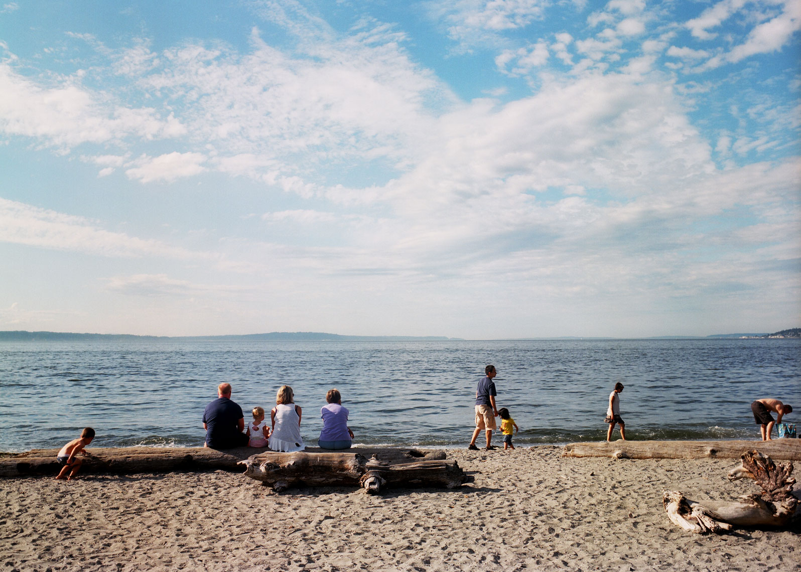 Editorial beach shot people hanging out 