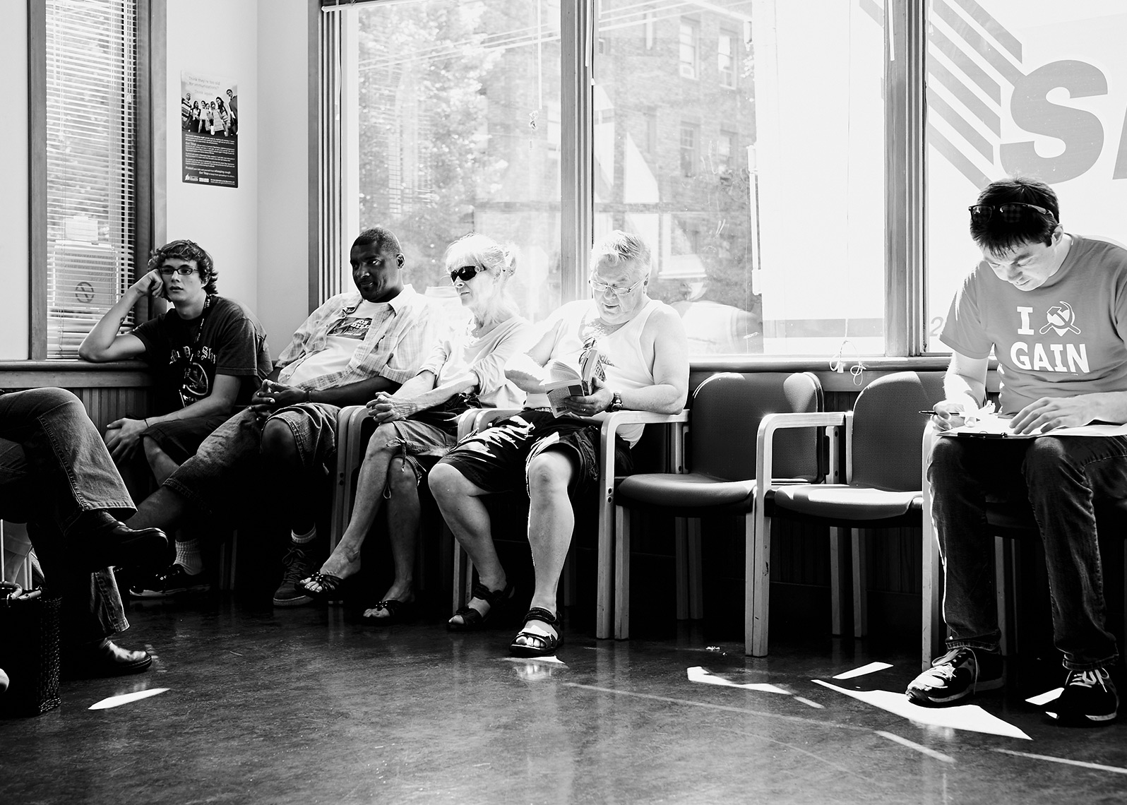 patients in a waiting room at community health facility 