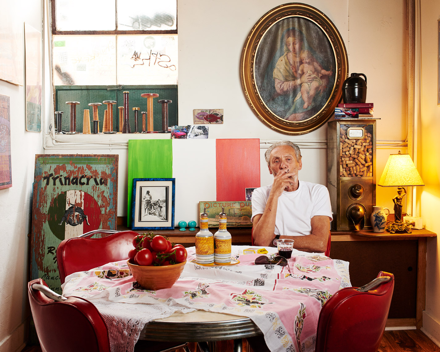 A chef  sits in his office for this candid portrait