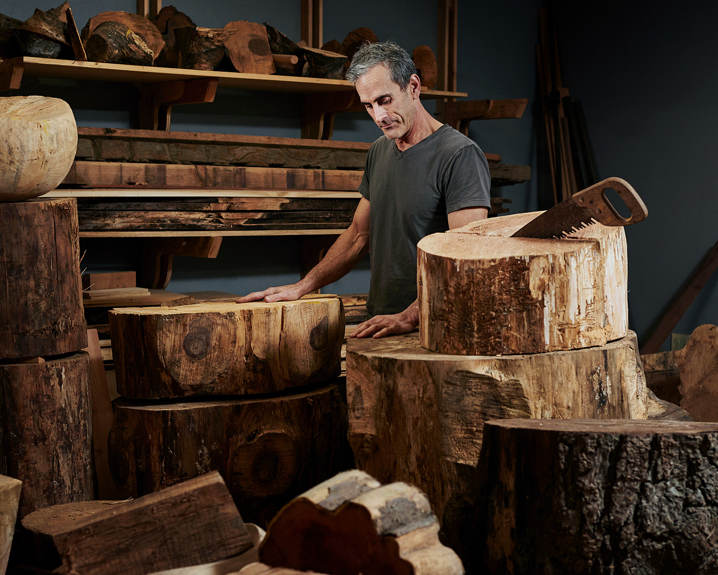 magazine portrait of artist Joel Sayer in his wood studio