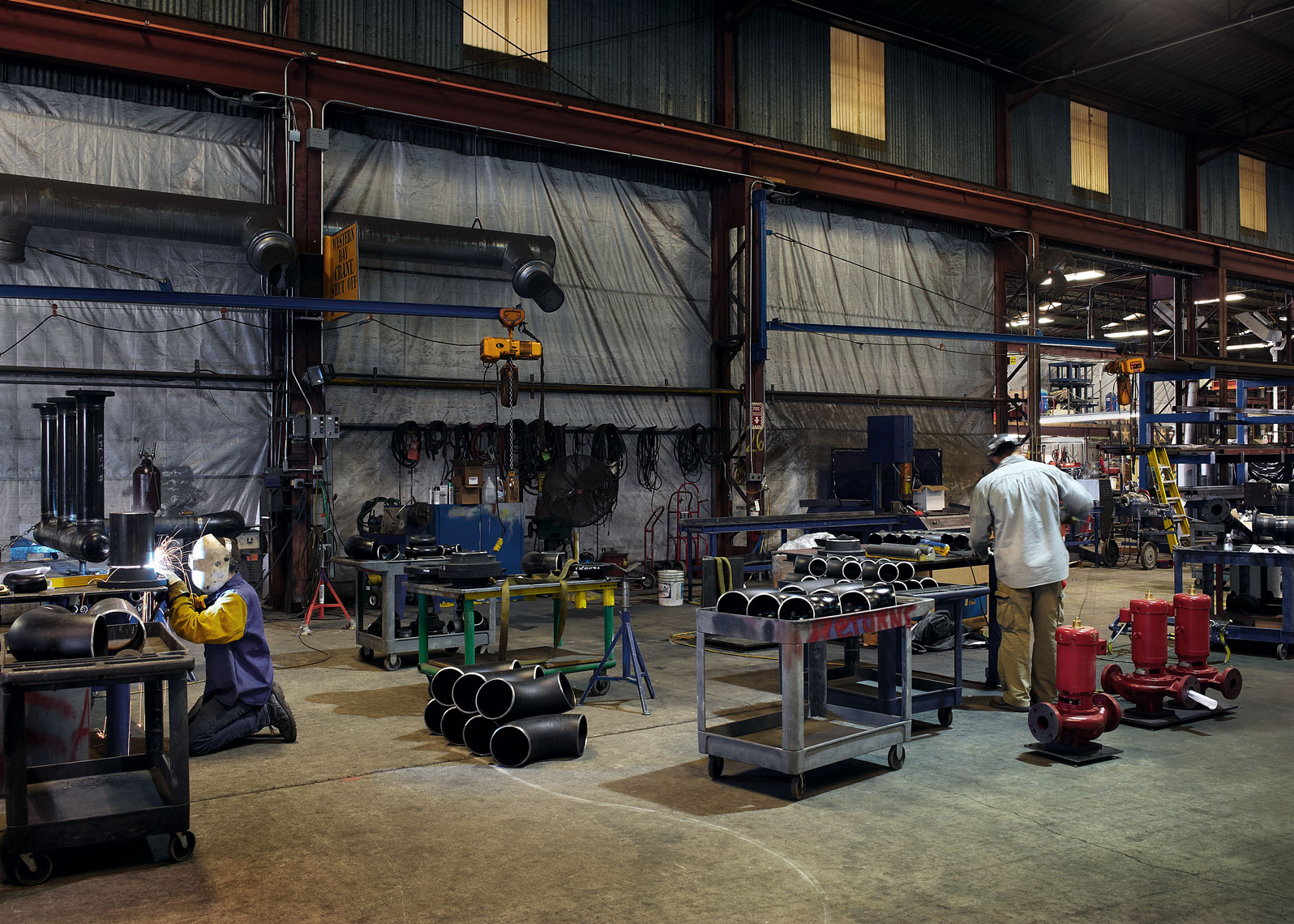 Seattle industrial photographer captures these men working in their shop