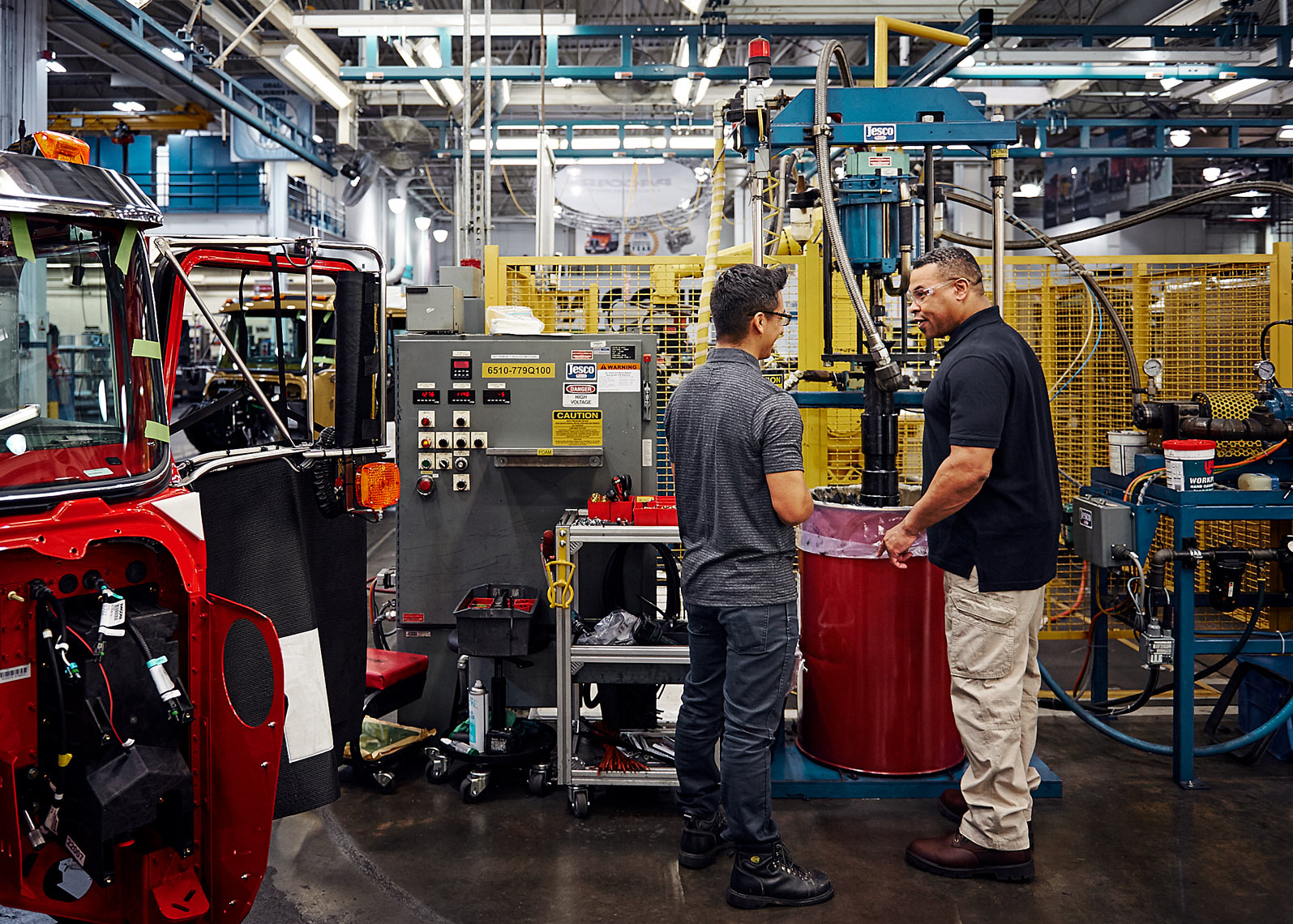 Seattle Industrial Photographer Amos Morgan documents workers in a truck shop